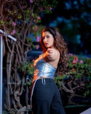 Sexy Actress Vishnu Priya Bhimeneni in a Silver Metallic Halter Chain Top with a Dark Denim Jeans Photos 03