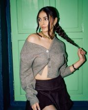 Stylish Heer Achhra in a Grey Cropped Knit Cardigan with a Black Mini Skirt Photos 02