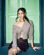 Stylish Heer Achhra in a Grey Cropped Knit Cardigan with a Black Mini Skirt Photos 04