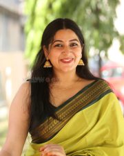 Actress Kanduri Sri Ranga Sudha in a Traditional Lime Green Silk Saree with a Sleeveless Blouse Photos 02
