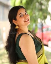 Actress Kanduri Sri Ranga Sudha in a Traditional Lime Green Silk Saree with a Sleeveless Blouse Photos 03