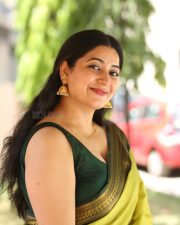 Actress Kanduri Sri Ranga Sudha in a Traditional Lime Green Silk Saree with a Sleeveless Blouse Photos 04