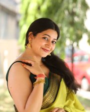 Actress Kanduri Sri Ranga Sudha in a Traditional Lime Green Silk Saree with a Sleeveless Blouse Photos 06