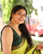 Actress Kanduri Sri Ranga Sudha in a Traditional Lime Green Silk Saree with a Sleeveless Blouse Photos 08