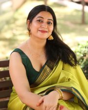 Actress Kanduri Sri Ranga Sudha in a Traditional Lime Green Silk Saree with a Sleeveless Blouse Photos 09