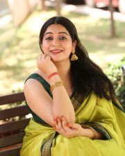Actress Kanduri Sri Ranga Sudha in a Traditional Lime Green Silk Saree with a Sleeveless Blouse Photos 11