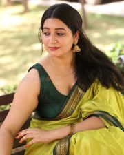 Actress Kanduri Sri Ranga Sudha in a Traditional Lime Green Silk Saree with a Sleeveless Blouse Photos 15