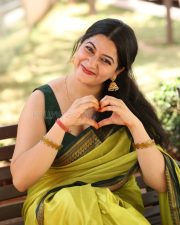 Actress Kanduri Sri Ranga Sudha in a Traditional Lime Green Silk Saree with a Sleeveless Blouse Photos 24