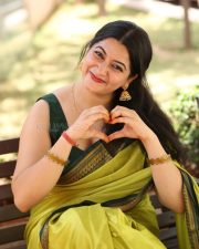 Actress Kanduri Sri Ranga Sudha in a Traditional Lime Green Silk Saree with a Sleeveless Blouse Photos 24