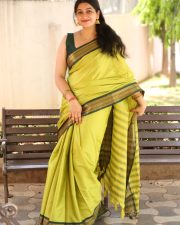 Actress Kanduri Sri Ranga Sudha in a Traditional Lime Green Silk Saree with a Sleeveless Blouse Photos 25