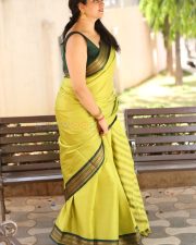 Actress Kanduri Sri Ranga Sudha in a Traditional Lime Green Silk Saree with a Sleeveless Blouse Photos 30