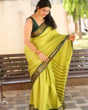 Actress Kanduri Sri Ranga Sudha in a Traditional Lime Green Silk Saree with a Sleeveless Blouse Photos 31