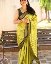Actress Kanduri Sri Ranga Sudha in a Traditional Lime Green Silk Saree with a Sleeveless Blouse Photos 33