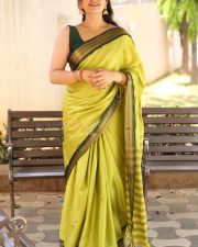 Actress Kanduri Sri Ranga Sudha in a Traditional Lime Green Silk Saree with a Sleeveless Blouse Photos 35