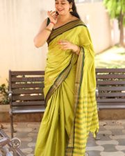Actress Kanduri Sri Ranga Sudha in a Traditional Lime Green Silk Saree with a Sleeveless Blouse Photos 36