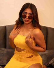 Actress Sahar Krishnan in a Yellow Strapless Side Cutout Mini Dress Photos 03