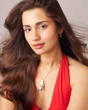 Akshardham Operation Vajra Shakti Actress Anushkaa Luhar in a Red Halter Neck Dress with Deep Cleavage Neckline Photos 02