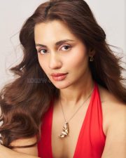 Akshardham Operation Vajra Shakti Actress Anushkaa Luhar in a Red Halter Neck Dress with Deep Cleavage Neckline Photos 03