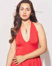 Akshardham Operation Vajra Shakti Actress Anushkaa Luhar in a Red Halter Neck Dress with Deep Cleavage Neckline Photos 04