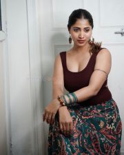 Casual Actress Sahar Krishnan in a burgundy top with patterned skirt Photos 03