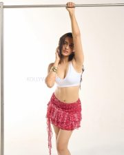 Hot Anushkaa Luhar in a White V Neck Crop Top with a Red Nuon Red Paisley Printed High Rise Ruffled Mini Skirt Pictures 03