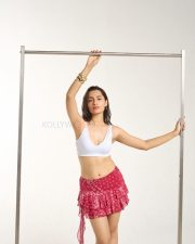 Hot Anushkaa Luhar in a White V Neck Crop Top with a Red Nuon Red Paisley Printed High Rise Ruffled Mini Skirt Pictures 05