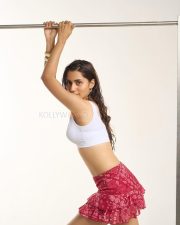 Hot Anushkaa Luhar in a White V Neck Crop Top with a Red Nuon Red Paisley Printed High Rise Ruffled Mini Skirt Pictures 06