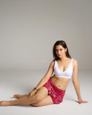 Hot Anushkaa Luhar in a White V Neck Crop Top with a Red Nuon Red Paisley Printed High Rise Ruffled Mini Skirt Pictures 08