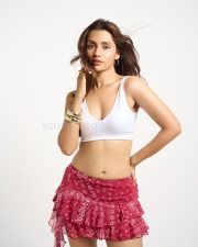 Hot Anushkaa Luhar in a White V Neck Crop Top with a Red Nuon Red Paisley Printed High Rise Ruffled Mini Skirt Pictures 10