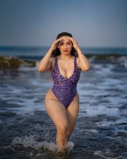 Bigg Boss Contestant Aditi Mistry in a Purple Mermaid Scale Printed One Piece Swimsuit Hot Photos 02
