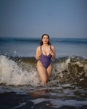 Bigg Boss Contestant Aditi Mistry in a Purple Mermaid Scale Printed One Piece Swimsuit Hot Photos 05