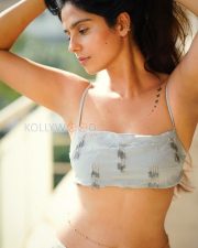 Confident Actress Rose Sardana in a Grey Fringe Crop Top And White Pants Photos 03