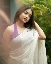 Elegant Actress Sanjana Tiwari in a white embroidered saree Photos 03