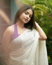 Elegant Actress Sanjana Tiwari in a white embroidered saree Photos 03