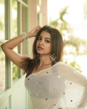 Elegant Actress Sanjana Tiwari in a white embroidered saree Photos 06