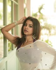 Elegant Actress Sanjana Tiwari in a white embroidered saree Photos 06