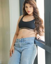 Sensual Mahima Gupta Navel in a Black sports bra and wide leg jeans Photos 01