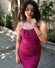 Stylish Actress Sanjana Tiwari in a Magenta Halter Midi Dress Photos 01