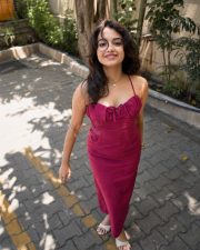 Stylish Actress Sanjana Tiwari in a Magenta Halter Midi Dress Photos 02