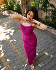 Stylish Actress Sanjana Tiwari in a Magenta Halter Midi Dress Photos 03