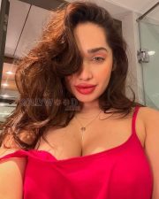 Sultry Aditi Mistry Cleavage in a Red Cami Top Photos 03