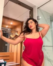 Sultry Aditi Mistry Cleavage in a Red Cami Top Photos 04