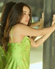 Winsome Actress Nuveksha in a Green Floral Satin Mini Dress Photos 04