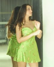 Winsome Actress Nuveksha in a Green Floral Satin Mini Dress Photos 06