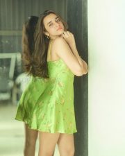 Winsome Actress Nuveksha in a Green Floral Satin Mini Dress Photos 08
