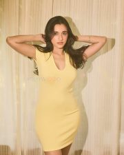 Winsome Actress Nuveksha in a Yellow Deep V Bodycon Mini Dress Photos 02