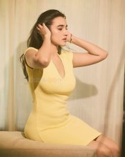 Winsome Actress Nuveksha in a Yellow Deep V Bodycon Mini Dress Photos 06