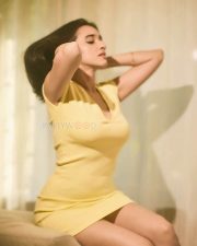 Winsome Actress Nuveksha in a Yellow Deep V Bodycon Mini Dress Photos 08