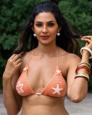 Alluring Manmeet Kaur Virk Cleavage in a Orange Crochet Bikini Top Photos 03