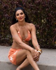 Alluring Manmeet Kaur Virk Cleavage in a Orange Crochet Bikini Top Photos 05